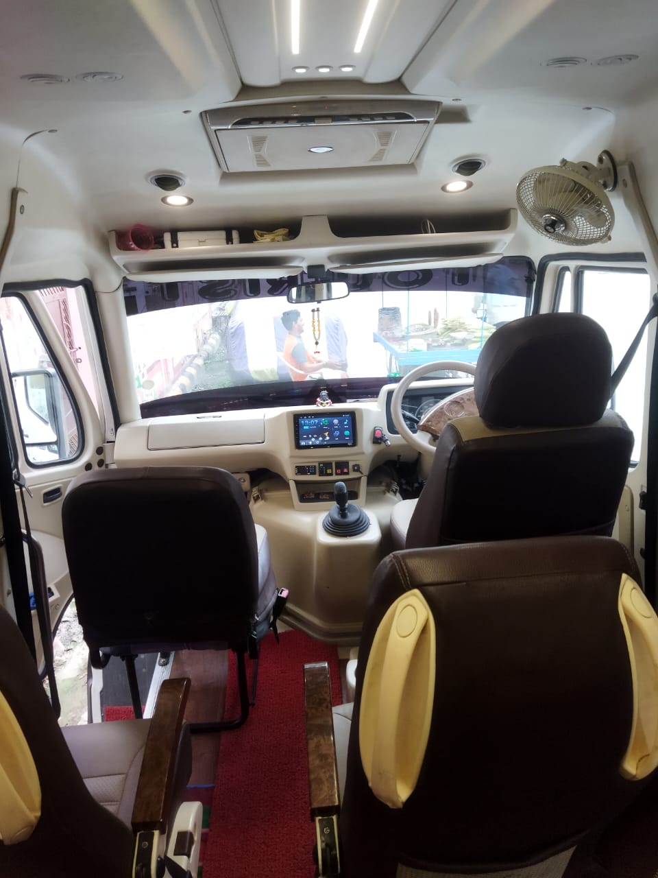 Luxury van interior with comfortable seating for group travel